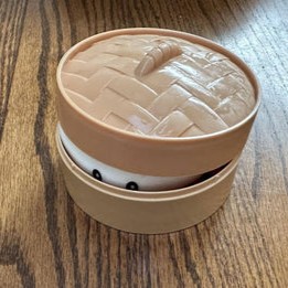 Dumpling squishy box on a table